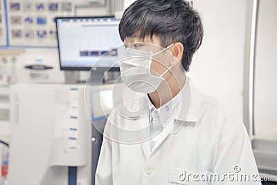 Asia scientist work in white Stock Photo