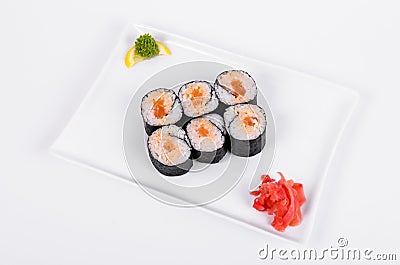 Asia. Spicy rolls with salmon red fish on a white plate on a w Stock Photo