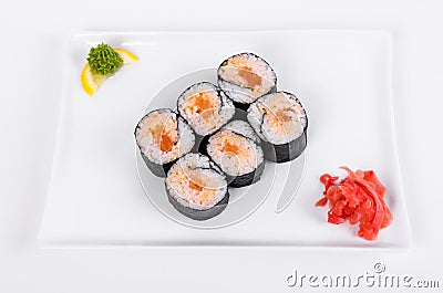 Asia. Spicy rolls with salmon red fish on a white plate on a w Stock Photo