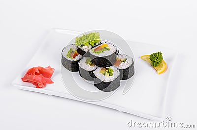 Asia. Vegetarian vegetable rolls on a white plate on a white background Stock Photo