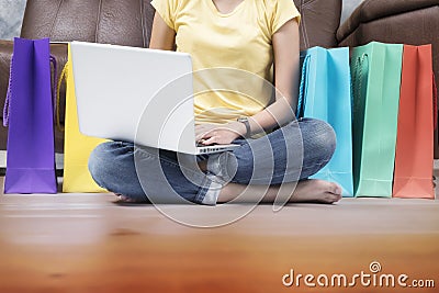Asia woman shopping online at home. Stock Photo