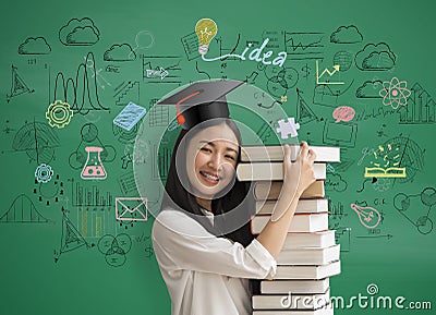 Asia women student holding book with with graduation hat on math Stock Photo