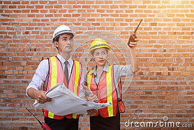 Asia, young engineers and women, quality inspection of building Stock Photo