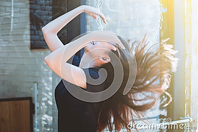 Asia youth teenage girl absurd posing on wall glass background. Stock Photo