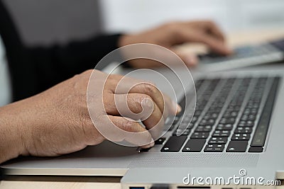 Asian accountant type keyboard to enter information, working, calculate and analyzing report chart graph Stock Photo