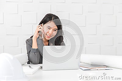 Asian architect at construction site office Stock Photo