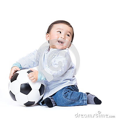 Asian baby boy feel excited playing soccer ball Stock Photo