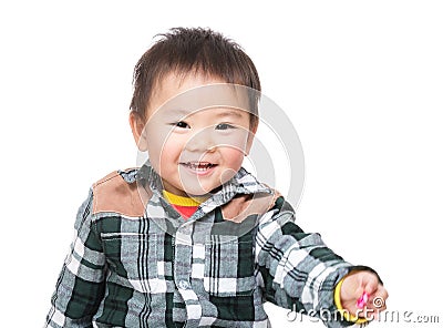 Asian baby boy give hand to you Stock Photo