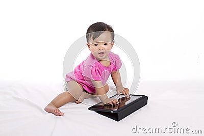 Asian baby with ipad Stock Photo