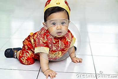 Asian baby using cheongsam dress for chinese new year Stock Photo