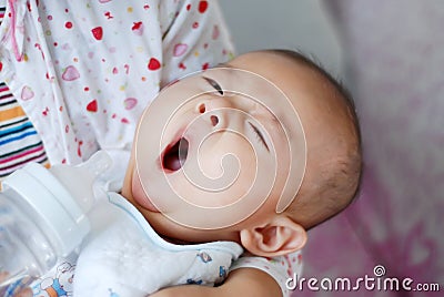 Asian baby yawning Stock Photo