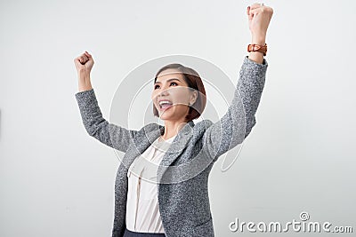 Asian beautiful girl feel happy. smiling woman show hand up successful sign action Stock Photo