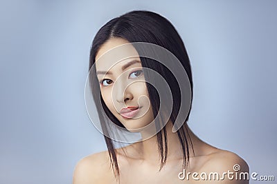 Asian beauty woman with creative make-up. Close-up portrait. Smiling girl Stock Photo