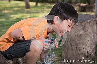 Asian boy drink water Stock Photo