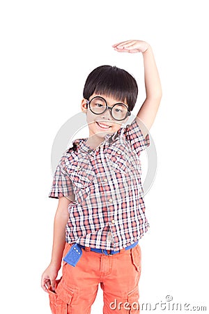 Asian boy growing tall and measuring himself Stock Photo