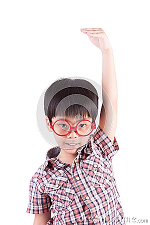 Asian boy growing tall and measuring himself Stock Photo