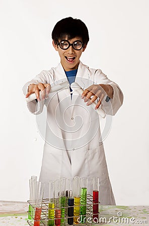 Asian boy pretending to be mad scientist Stock Photo