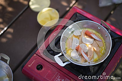 Asian Breakfast Cooking, Suitable food for camping Stock Photo