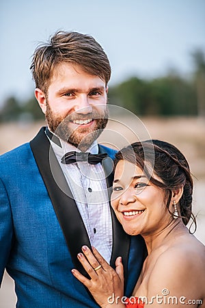 Asian bride and Caucasian groom have romance time and happy Stock Photo