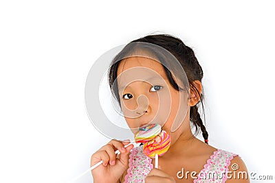 Asian broken teeth girl and big lollypop Stock Photo