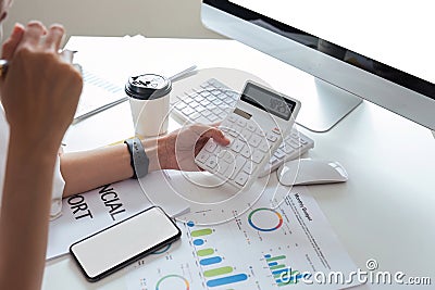 Asian business analyze the situation on the financial report in the meeting room. Investment Consultant, Financial Stock Photo