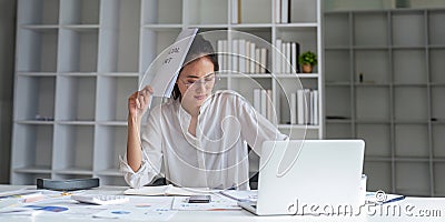 Asian business analyze the situation on the financial report in the work room. Investment Consultant, Financial Stock Photo