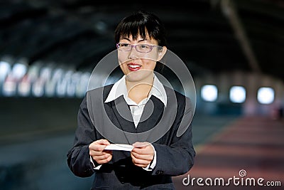 Asian business woman with calling card Stock Photo