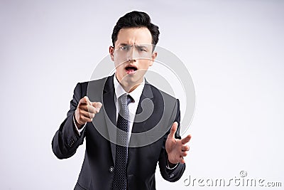 Asian businessman with mouth open Stock Photo