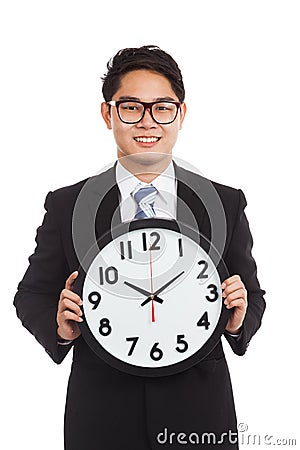 Asian businessman with a clock Stock Photo