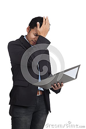 Asian businessman headache with a folder Stock Photo