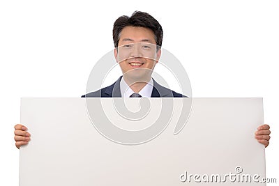 An Asian businessman holding a blank message board Stock Photo