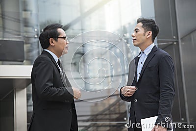 Asian Businessman partner consulting and discussing for business Stock Photo