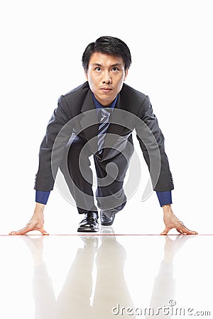 Asian businessman start to run Stock Photo