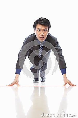 Asian businessman start to run Stock Photo