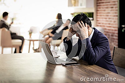 Asian Businessman strain and got pressured Stock Photo