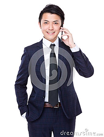 Asian businessman talk to cellphone Stock Photo