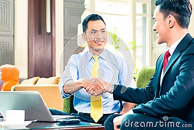 Asian Businessmen having meeting Stock Photo