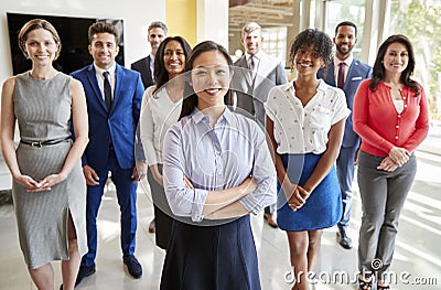 Asian businesswoman and her business team, group portrait Stock Photo