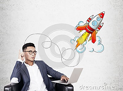 Asian CEO and rocket sketch Stock Photo