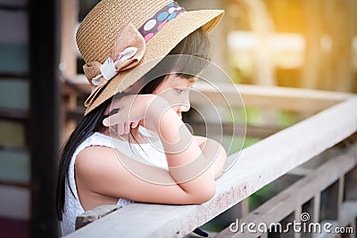 Asian child girl in a lonely mood Stock Photo