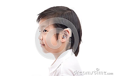 Asian child with hearing aid Stock Photo