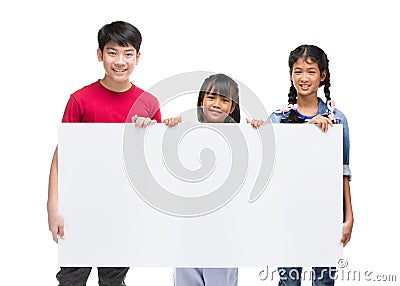 Asian child holds blank sign. Teen boy and girl holds empty billboard Stock Photo