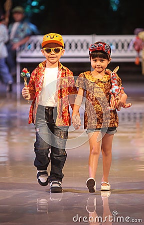 Asian child model at fashion show runway Editorial Stock Photo