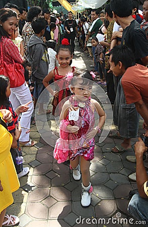 Asian children model wearing batik at fashion show runway Editorial Stock Photo