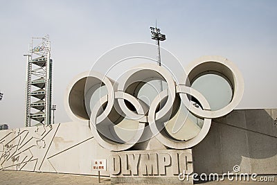 Asian Chinese, Beijing Olympic Park, medals, wall, the Olympic rings Editorial Stock Photo