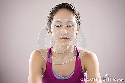 Asian chinese female athlete feeling demotivated and staring int Stock Photo