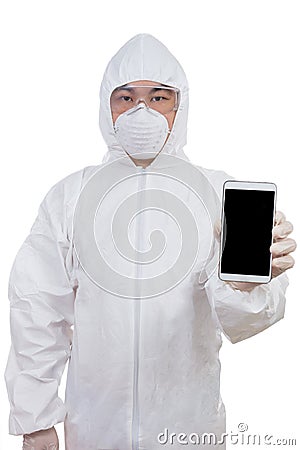 Asian Chinese scientist in protective wear showing mobile phone Stock Photo
