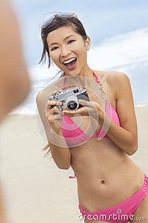 https://thumbs.dreamstime.com/x/asian-chinese-woman-girl-camera-beach-bikini-beautiful-young-women-wearing-pink-looking-happy-taking-pictures-36916642.jpg