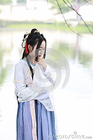 Asian Chinese woman in traditional Hanfu dressï¼Œclassic beauty in Chin Stock Photo