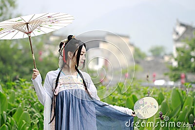 Asian Chinese woman in traditional Hanfu dressï¼Œclassic beauty in Chin Stock Photo